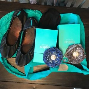 Tieks matte black worn shoes
